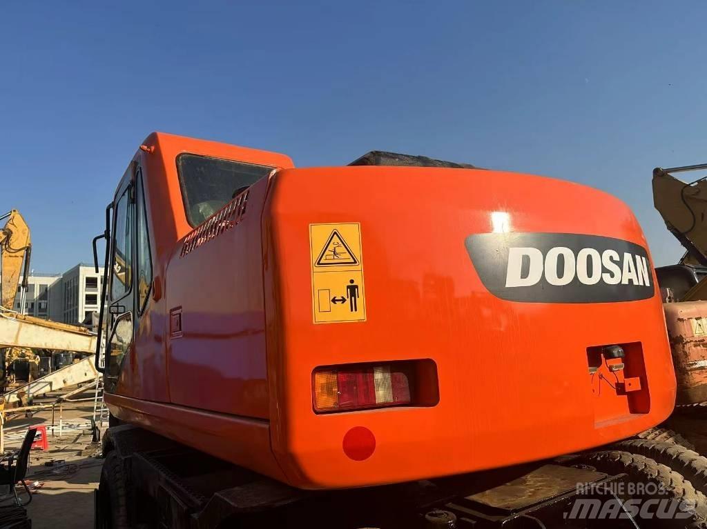 Doosan 150 W-7 حفارات بعجل