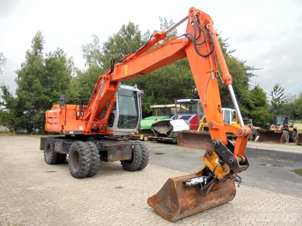Hitachi FH 130 W-3 حفارات بعجل