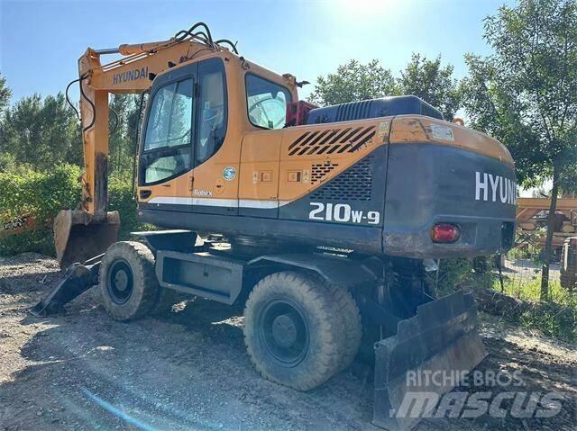 Hyundai 210W حفارات بعجل