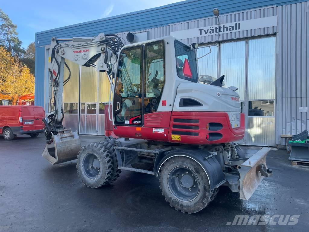 Takeuchi TB 295 W حفارات بعجل