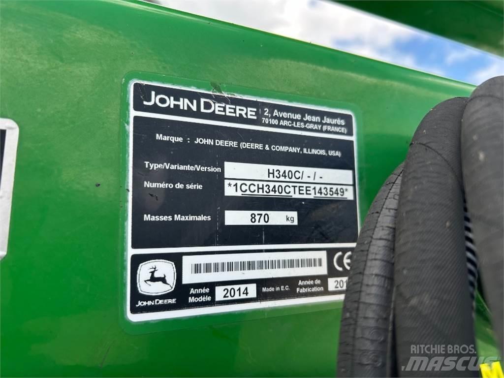 John Deere 6115M الجرارات