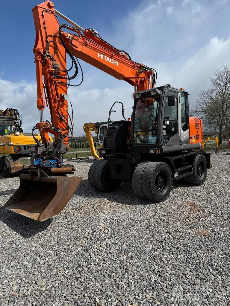 Hitachi ZX 145 W-3 حفارات بعجل