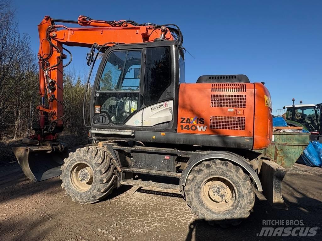 Hitachi ZX 140 W-5B حفارات بعجل
