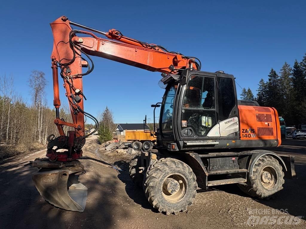 Hitachi ZX 140 W-5B حفارات بعجل