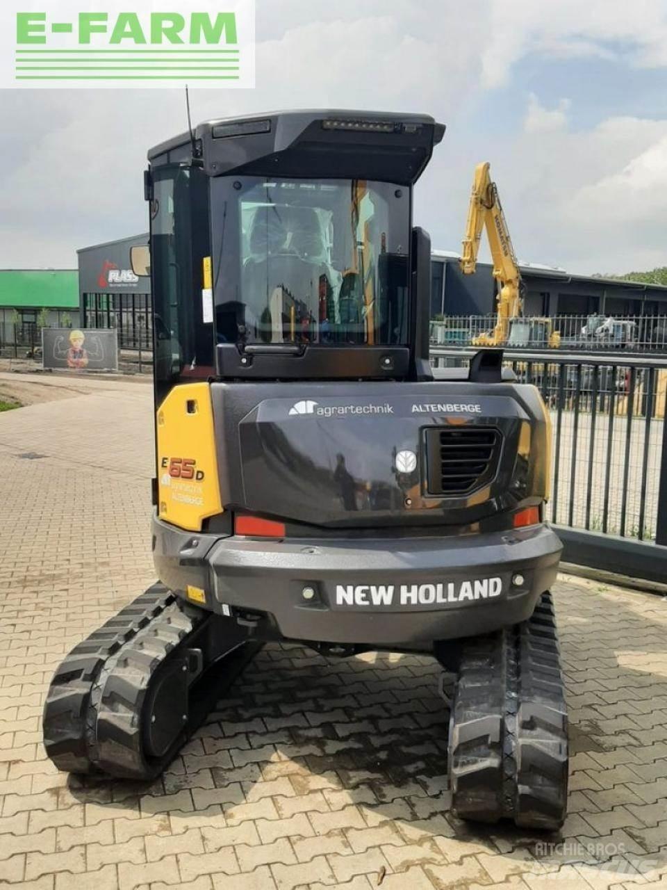New Holland e65d حفارات بعجل