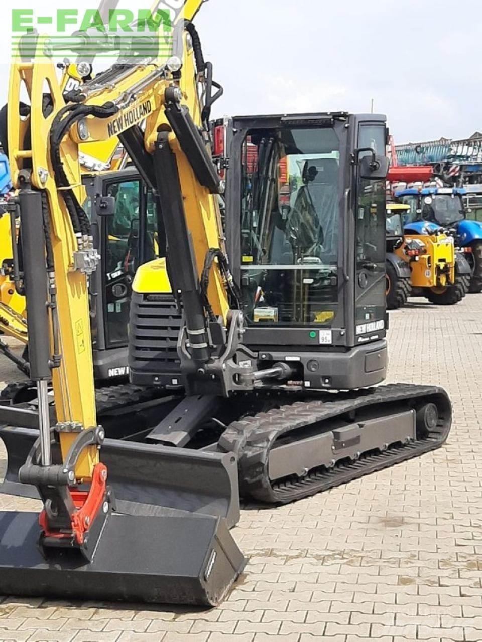 New Holland e65d حفارات بعجل