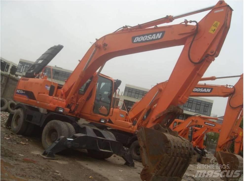 Doosan DH 210 W-7 حفارات بعجل
