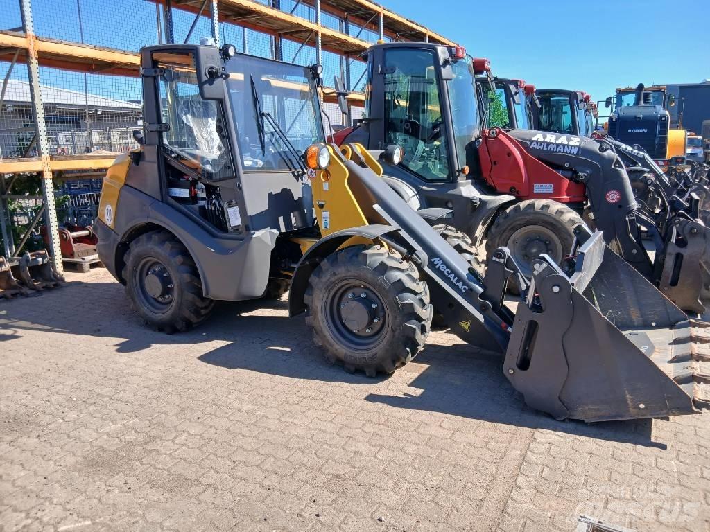 Mecalac AX 700 لوادر بعجل