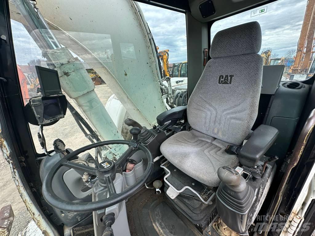CAT M 316 D حفارات بعجل