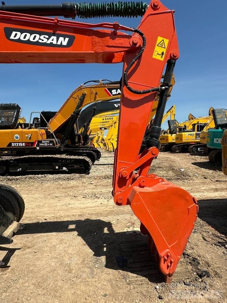 Doosan DX 150 حفارات بعجل