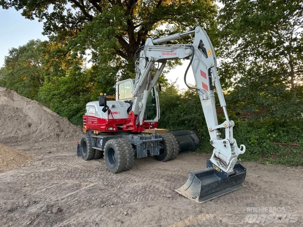 Takeuchi TB295W حفارات بعجل