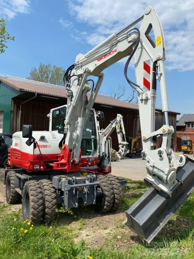 Takeuchi TB295W حفارات بعجل