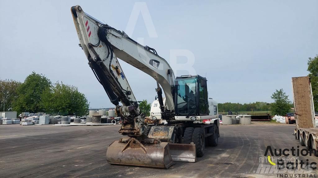 CAT M 322 D حفارات بعجل