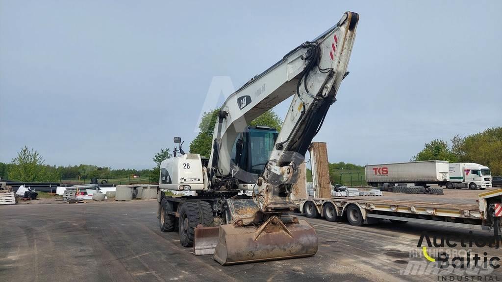 CAT M 322 D حفارات بعجل