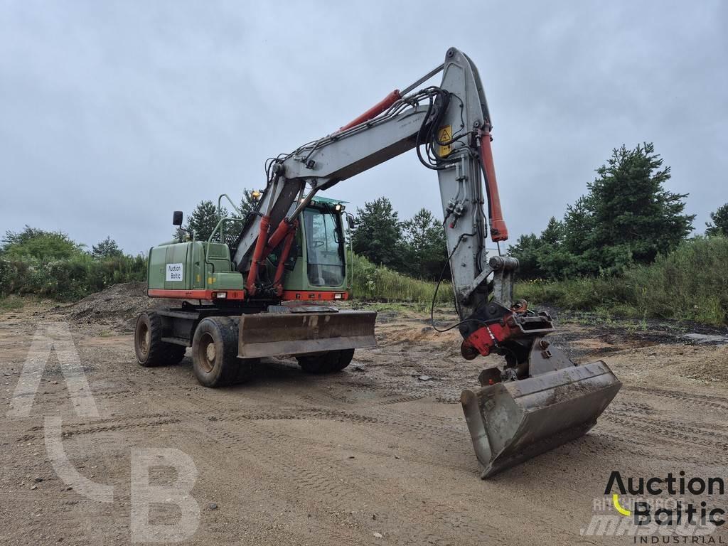 Volvo EW 140 C حفارات بعجل