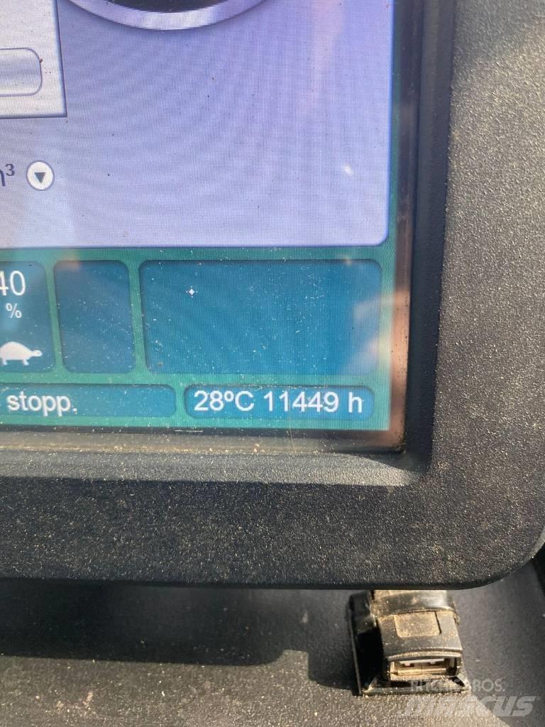 John Deere 1210 G شاحنات