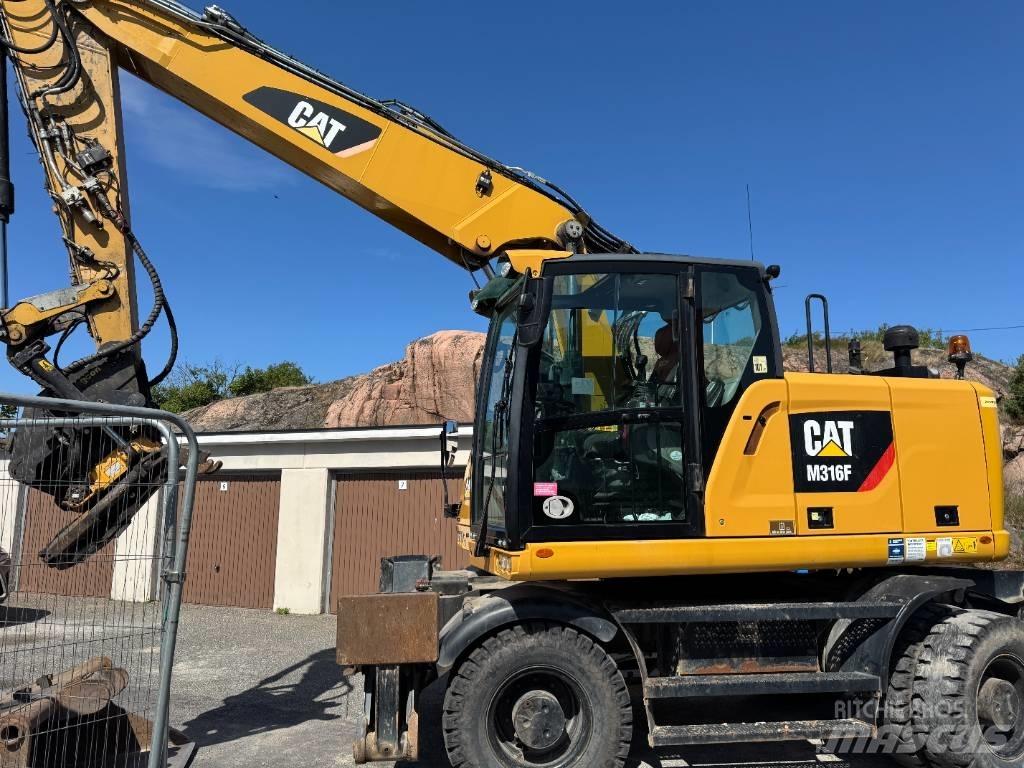 CAT M316F حفارات بعجل