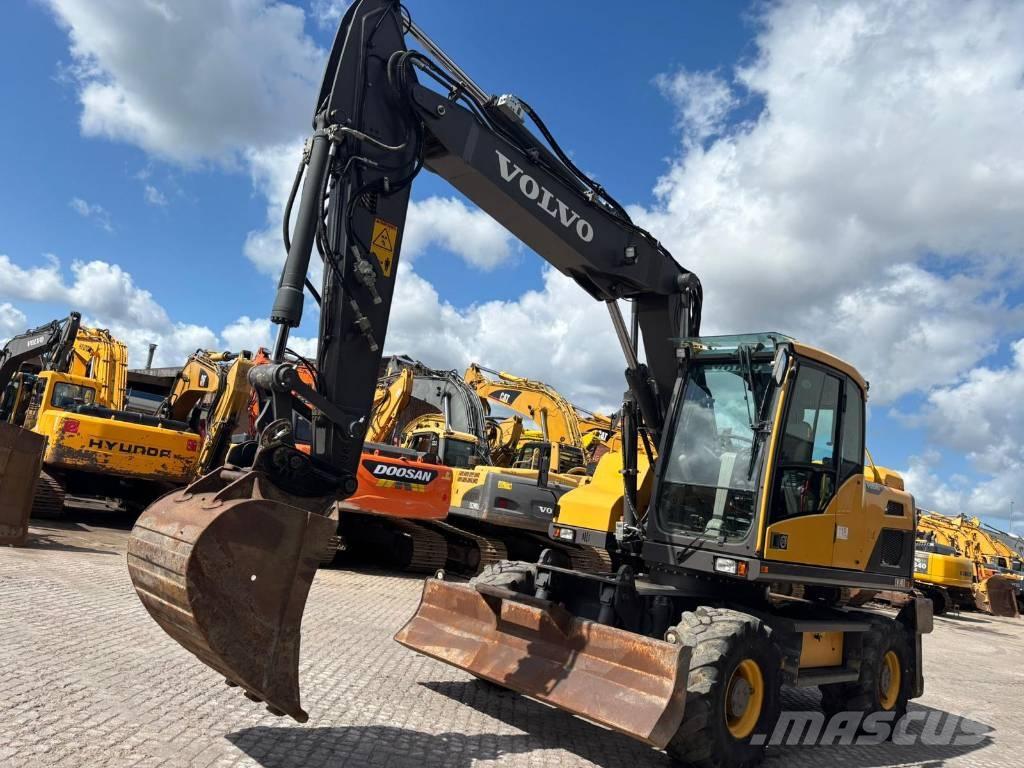Volvo EW 140 D حفارات بعجل