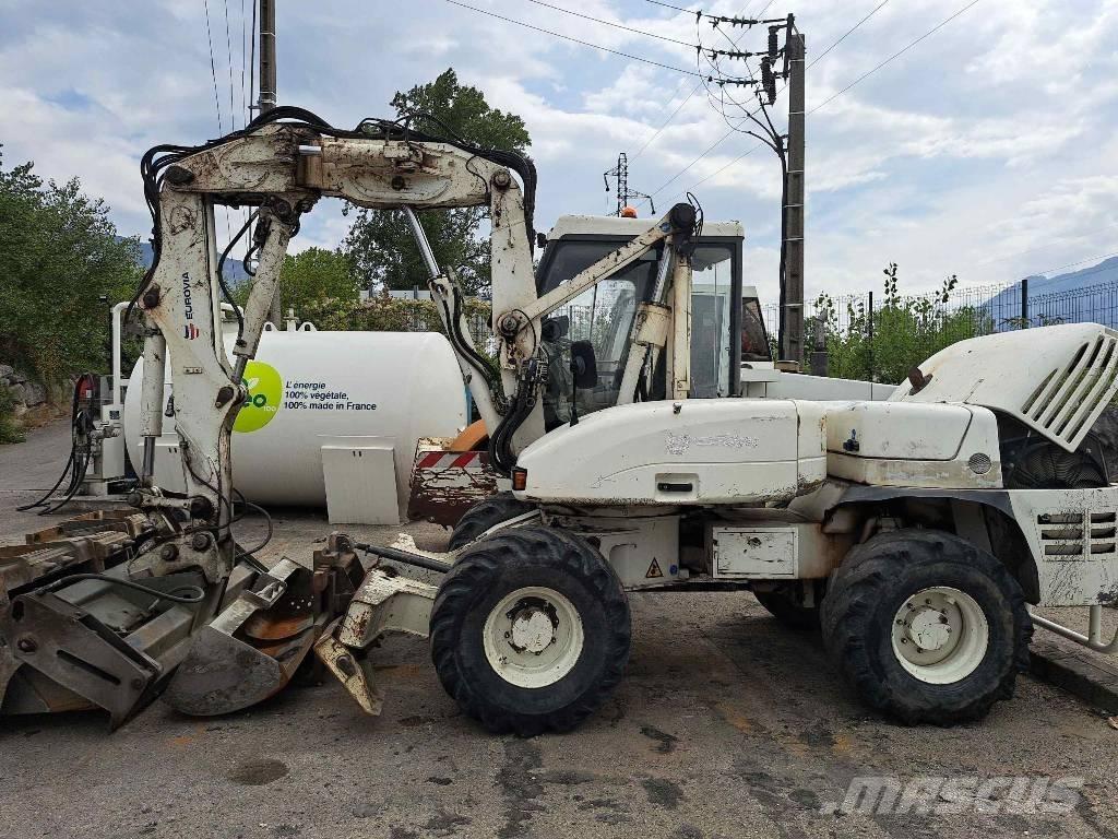 Mecalac 12 MTX حفارات بعجل
