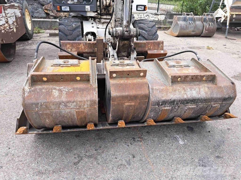 Mecalac 12 MTX حفارات بعجل