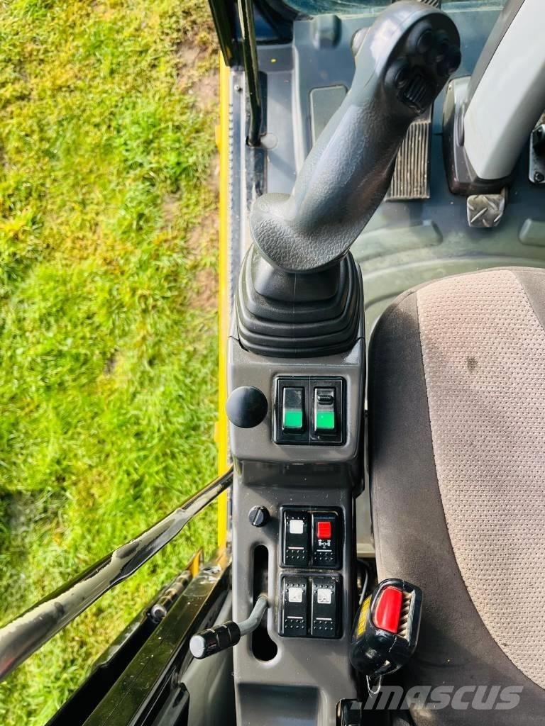 CAT M 315 D حفارات بعجل