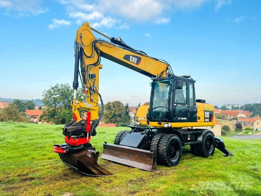 CAT M 315 D حفارات بعجل
