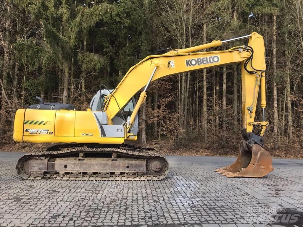 New Holland E 215 B حفارات زحافة