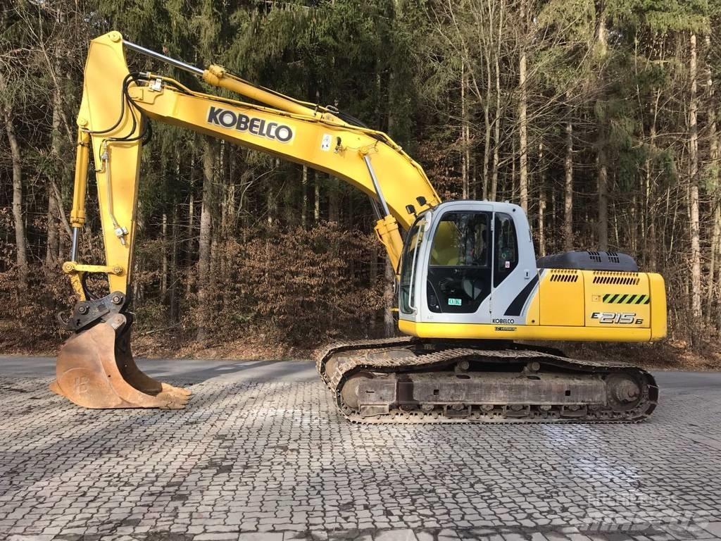 New Holland E 215 B حفارات زحافة