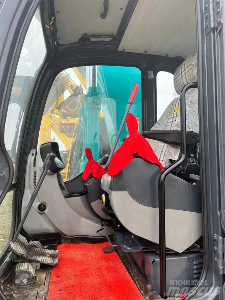 Kobelco SK 140 حفارات زحافة