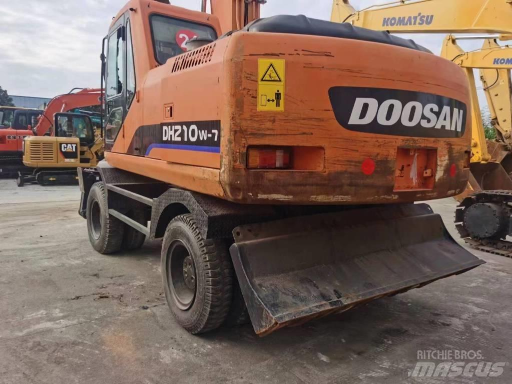 Doosan DH 210 W-7 حفارات بعجل
