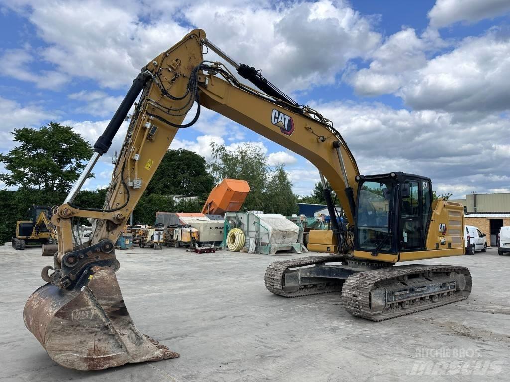 CAT 323 حفارات زحافة