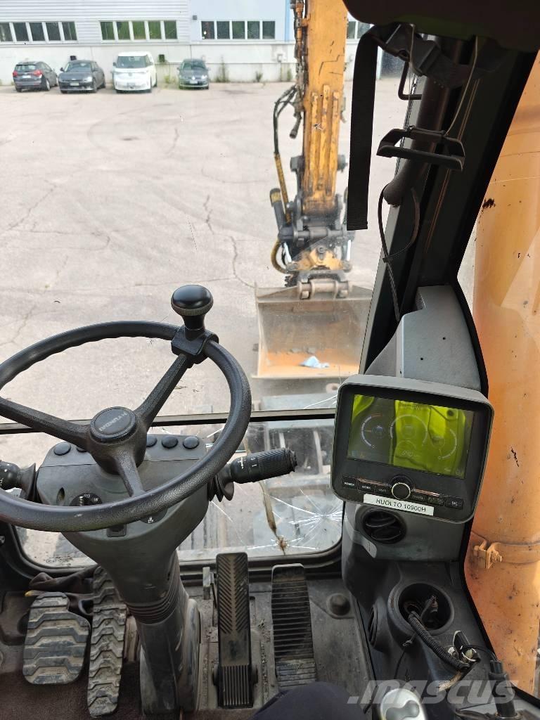 Hyundai R170-W9 حفارات بعجل