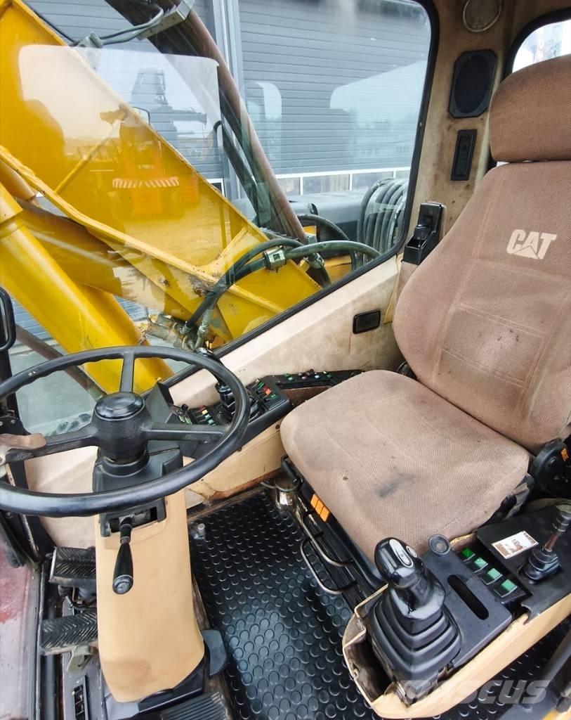 CAT M 315 حفارات بعجل