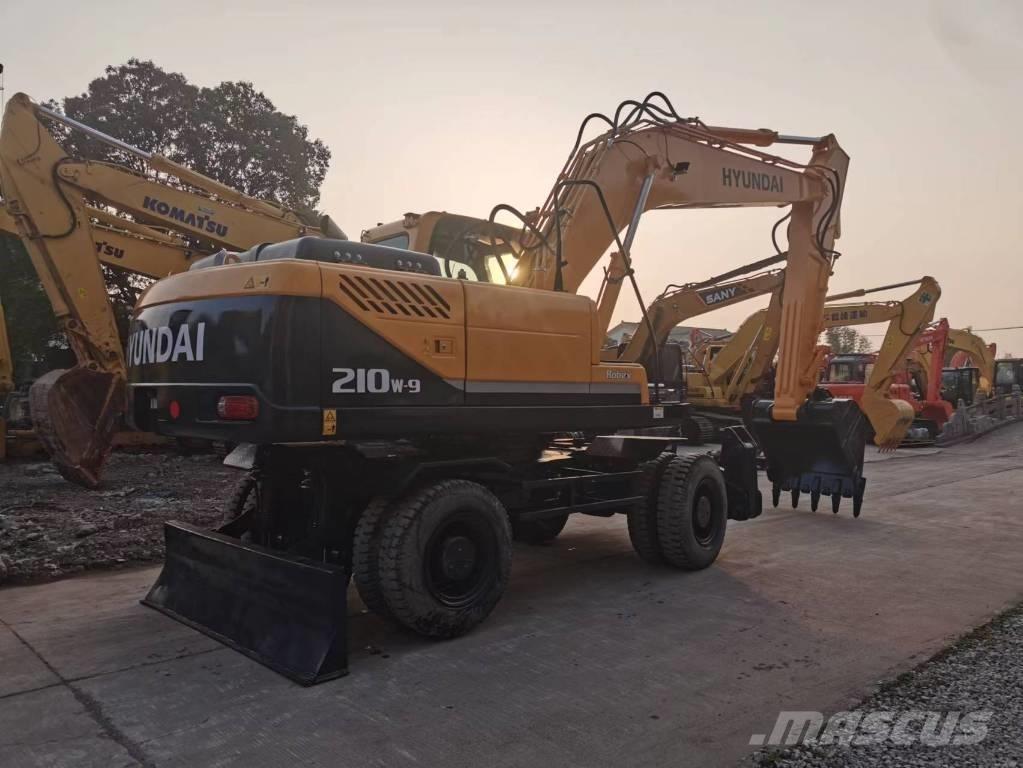 Hyundai R210W-7 حفارات بعجل