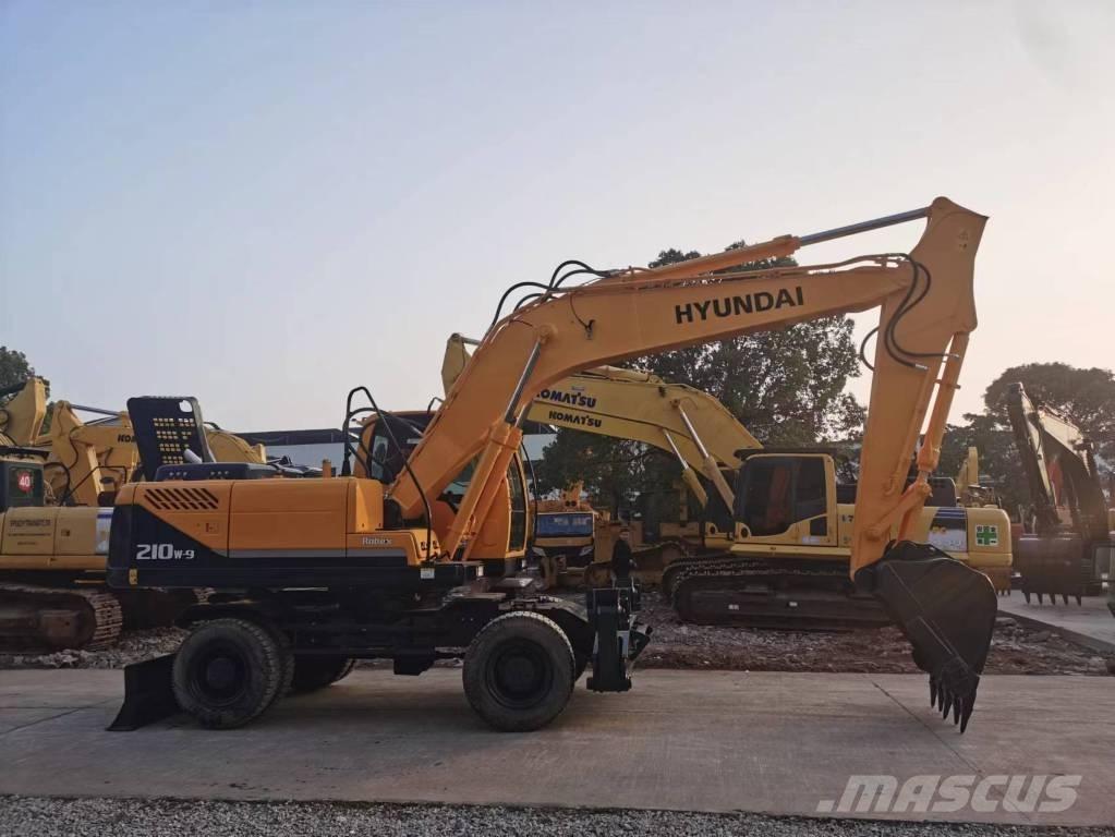 Hyundai R210W-7 حفارات بعجل