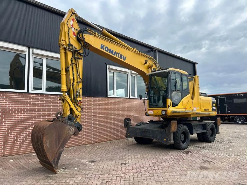 Komatsu PW200 حفارات بعجل