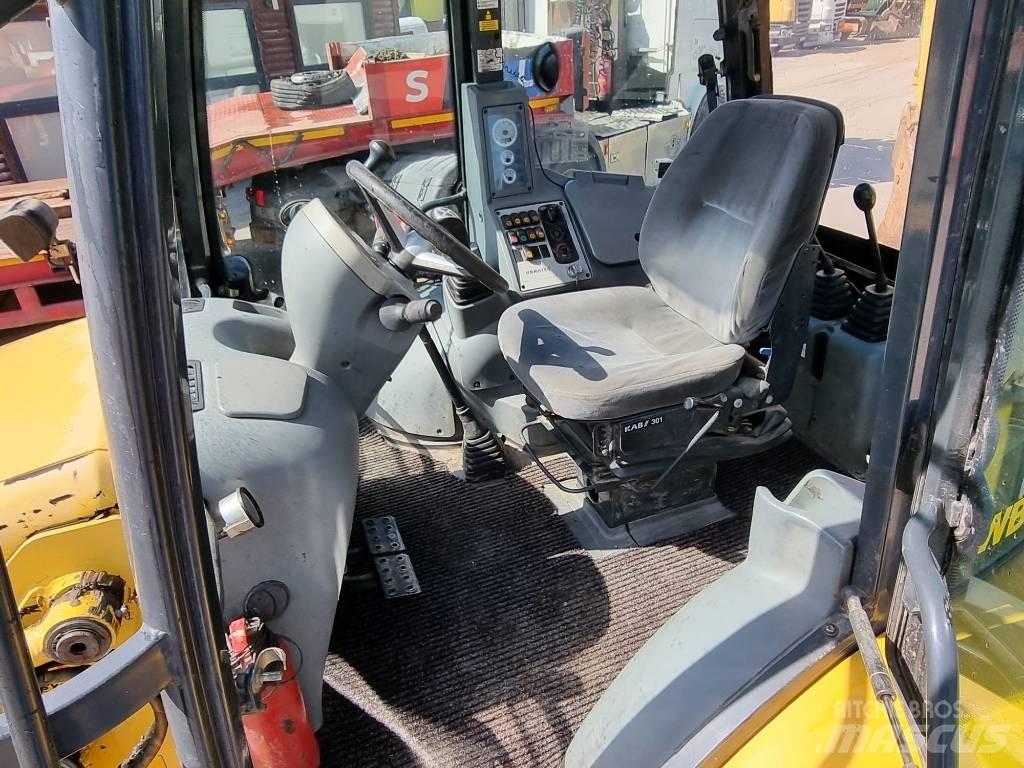Komatsu WB 93 S-5EO لوادر ذات جرافات عكسية