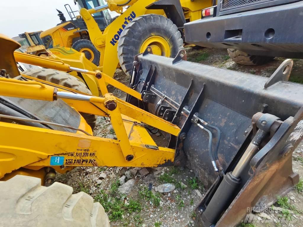 JCB 4 CX لوادر ذات جرافات عكسية