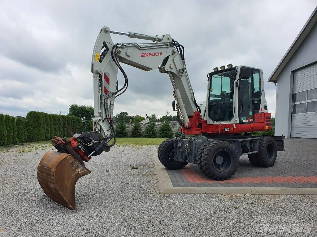 Takeuchi TB295W حفارات بعجل