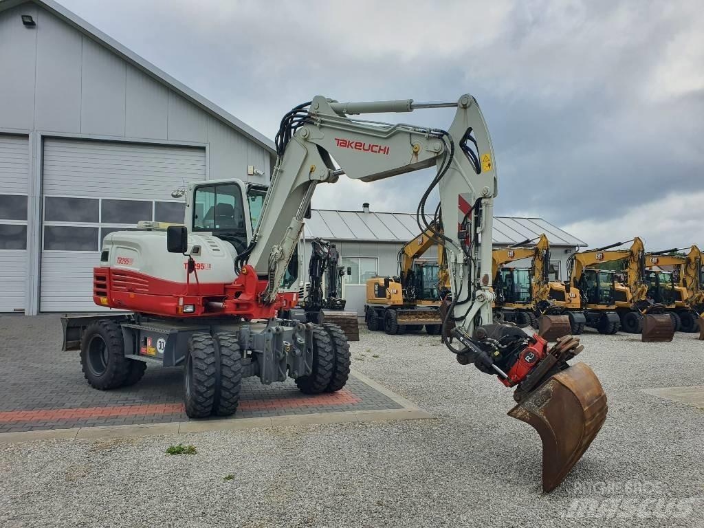 Takeuchi TB295W حفارات بعجل