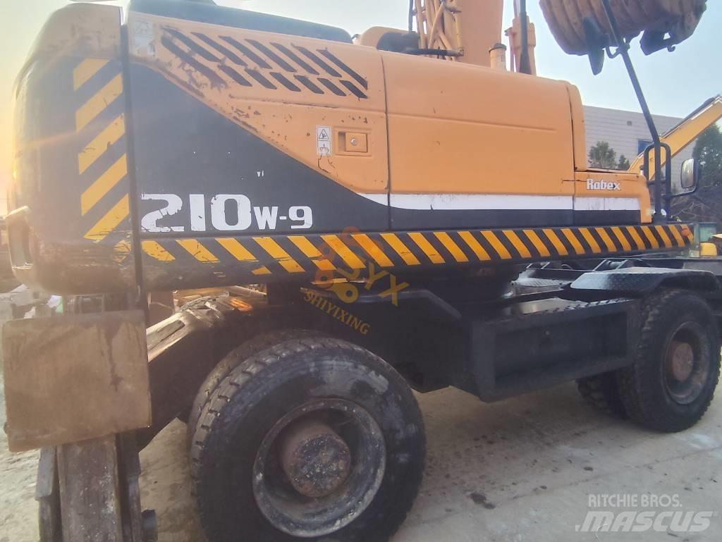 Hyundai 210W-9 حفارات بعجل