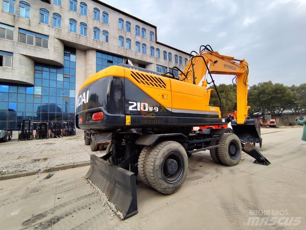 Hyundai 210W-9 حفارات بعجل