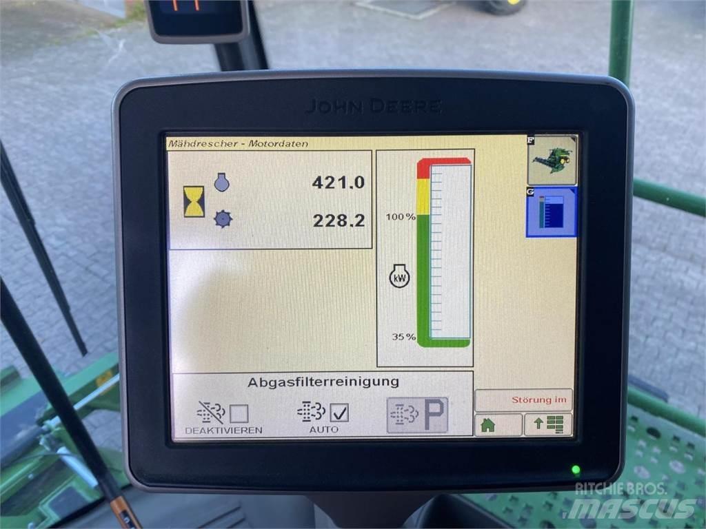 John Deere T550 حصادات