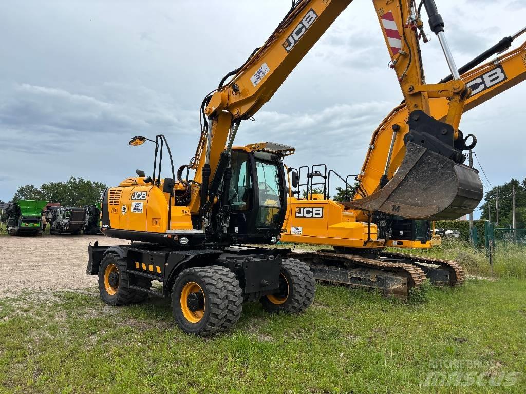 JCB JS 145 W حفارات بعجل