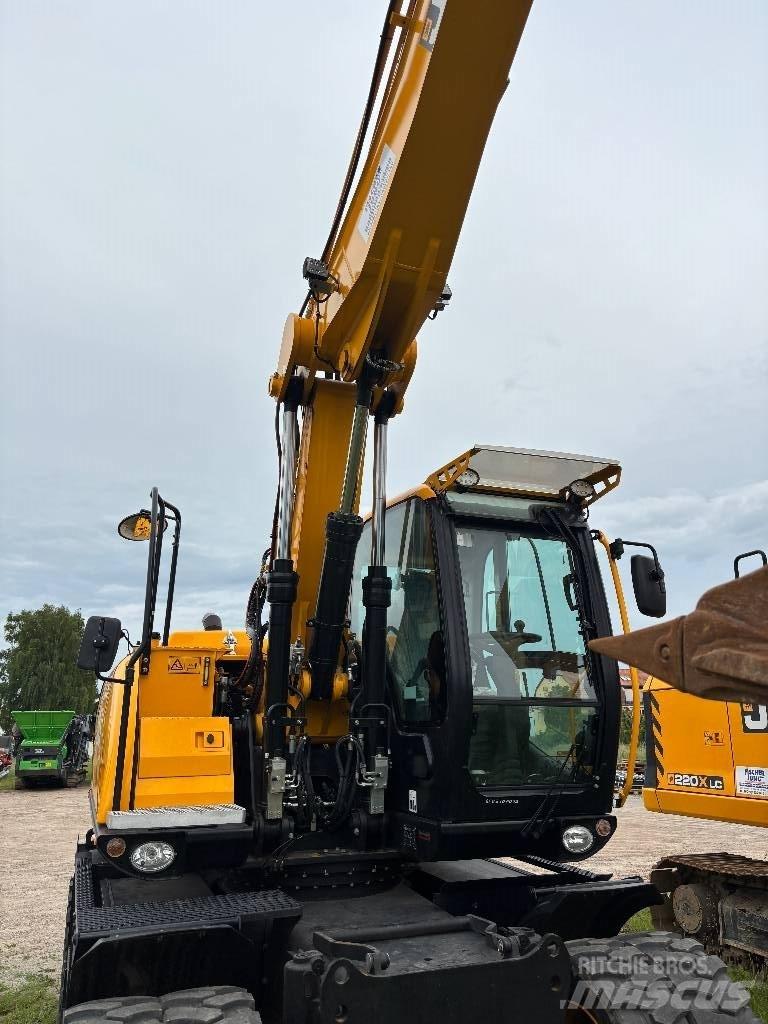 JCB JS 145 W حفارات بعجل