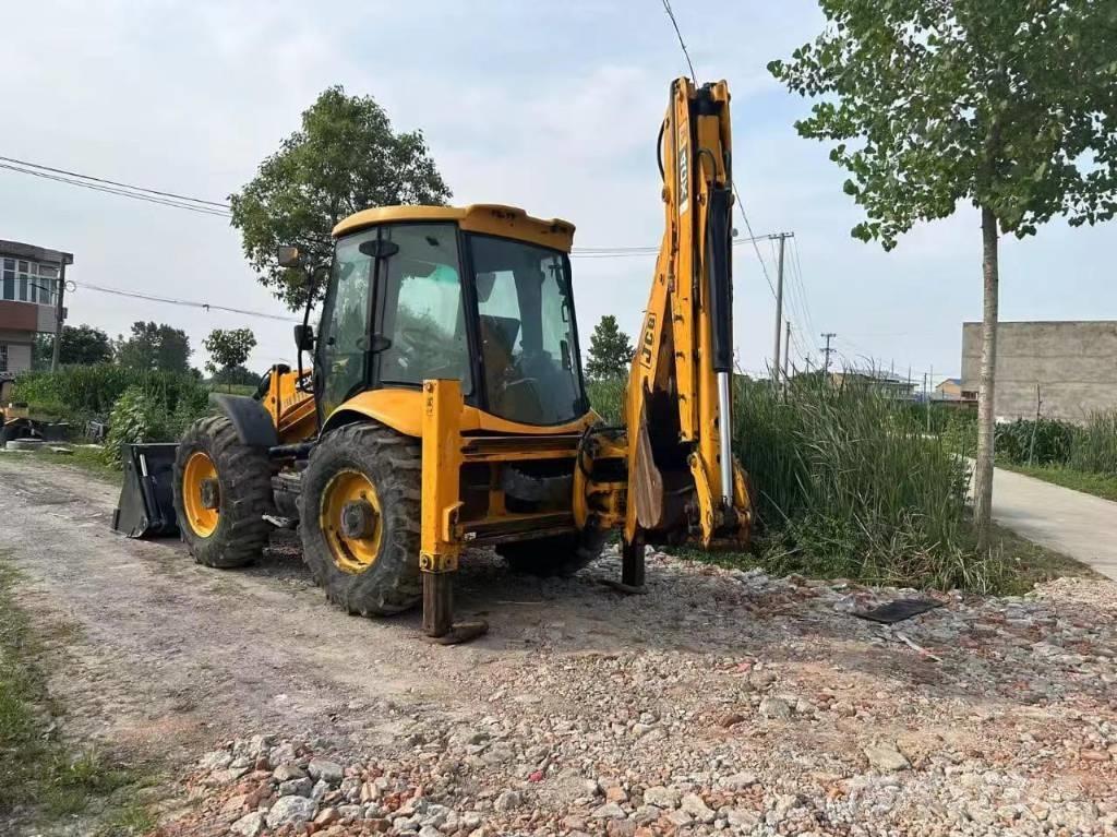 JCB 4CX لوادر ذات جرافات عكسية