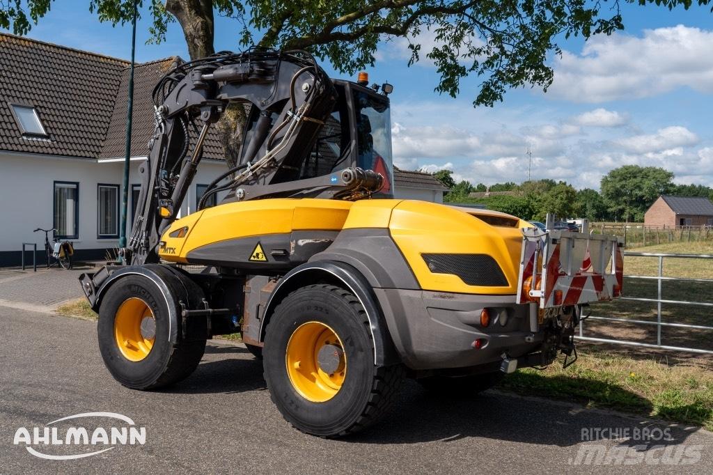 Mecalac 12 MTX حفارات بعجل
