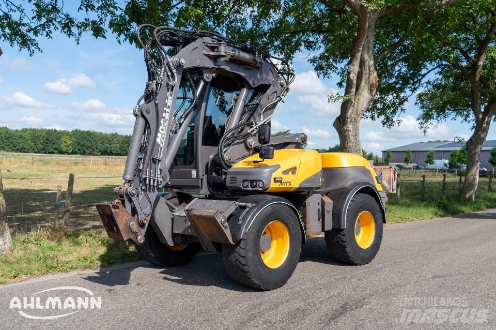 Mecalac 12 MTX حفارات بعجل