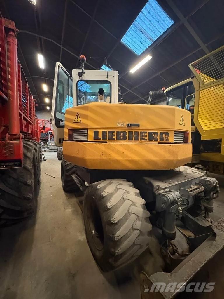 Liebherr A308 حفارات بعجل
