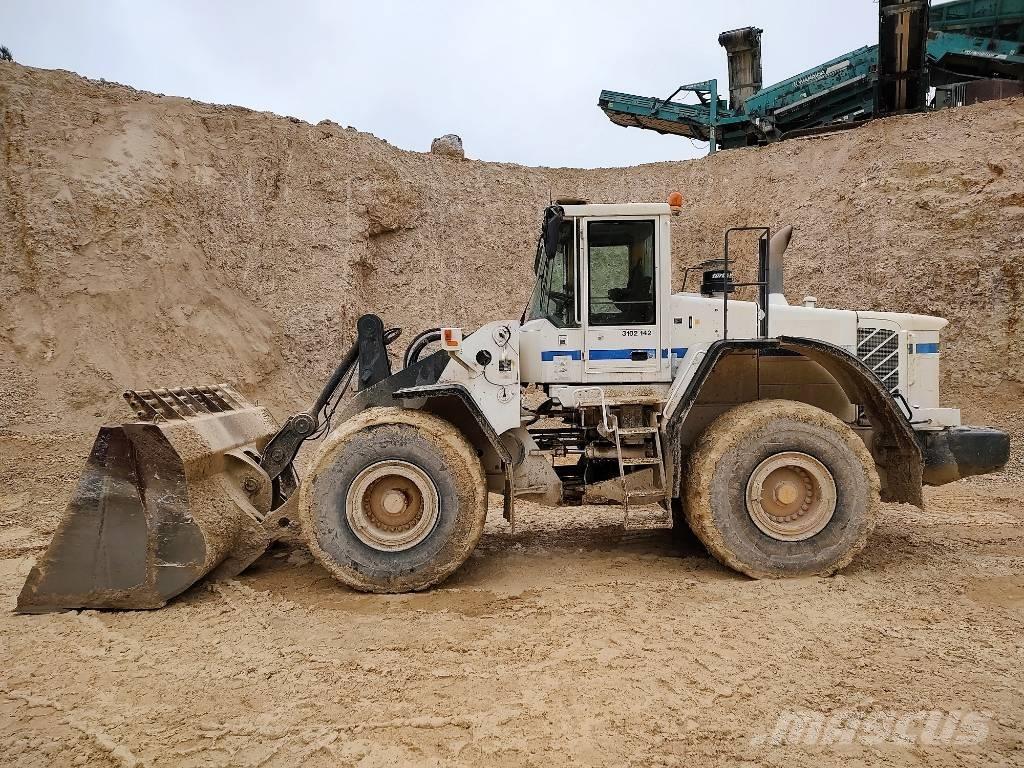 Volvo L 180 E لوادر بعجل